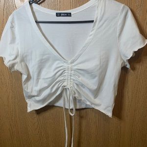 white crop top with string in front